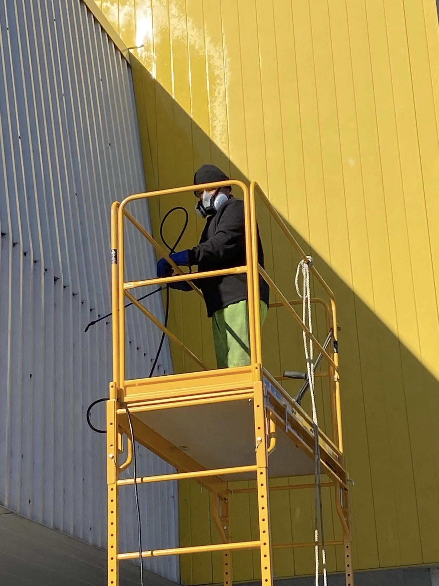 Commercial building exterior cleaning by Bloodhound Ops.