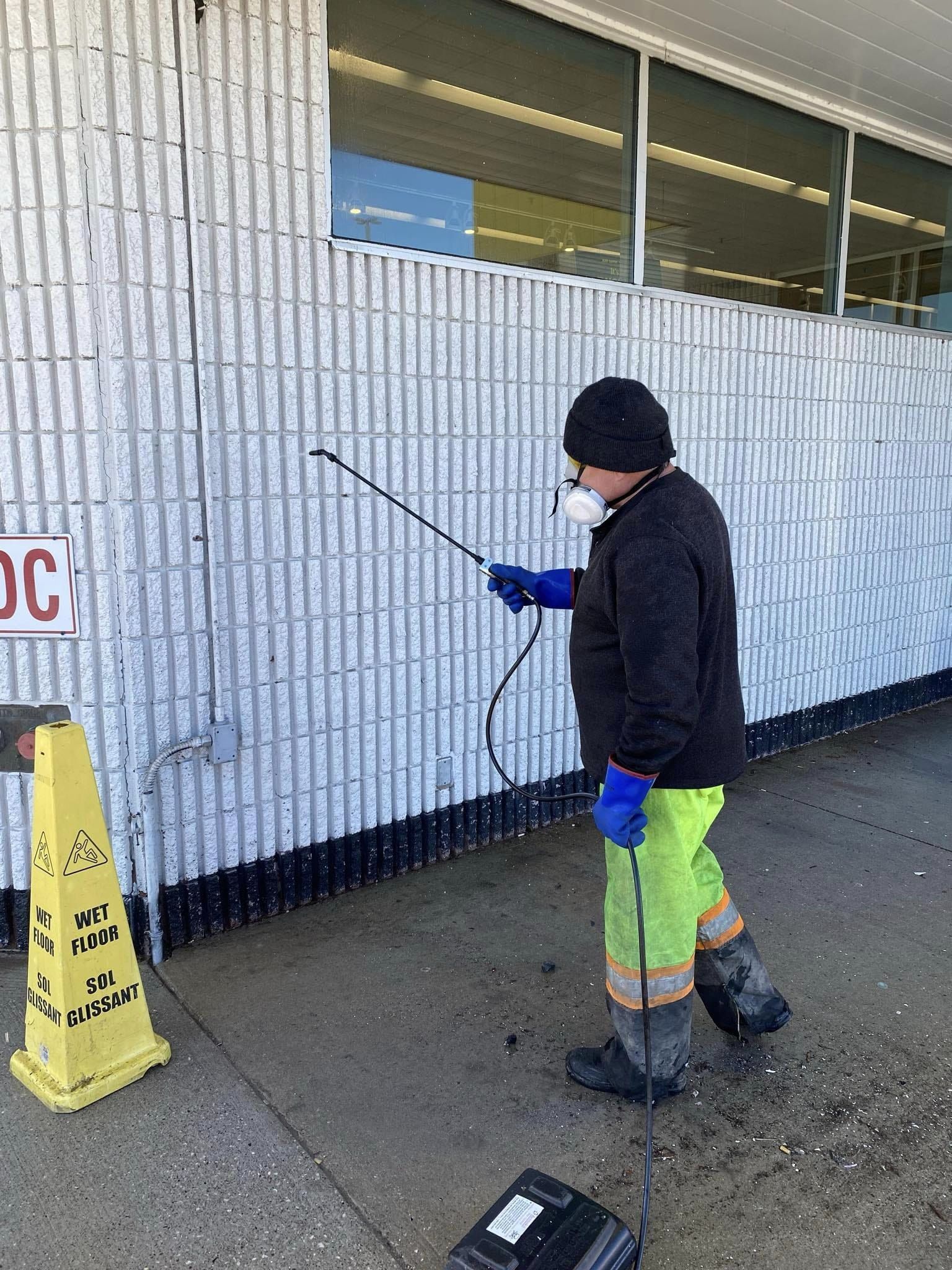 Commercial building exterior cleaning by Bloodhound Ops.