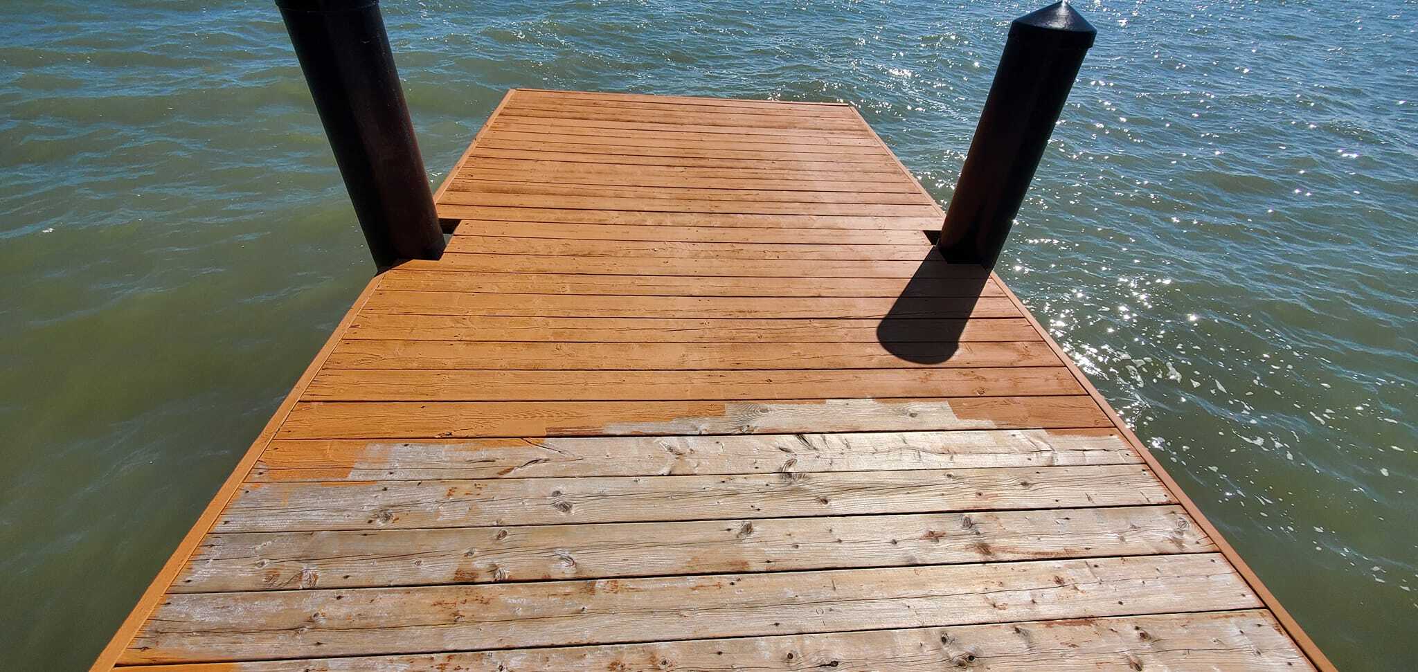 Boat deck power washing before and after shot.