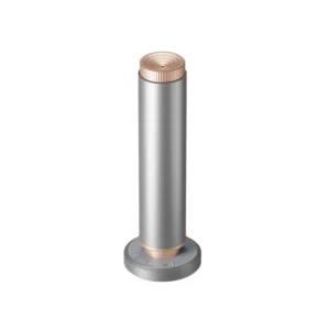 A cylindrical diffuser with brushed grey metal finish containing rose gold accents.